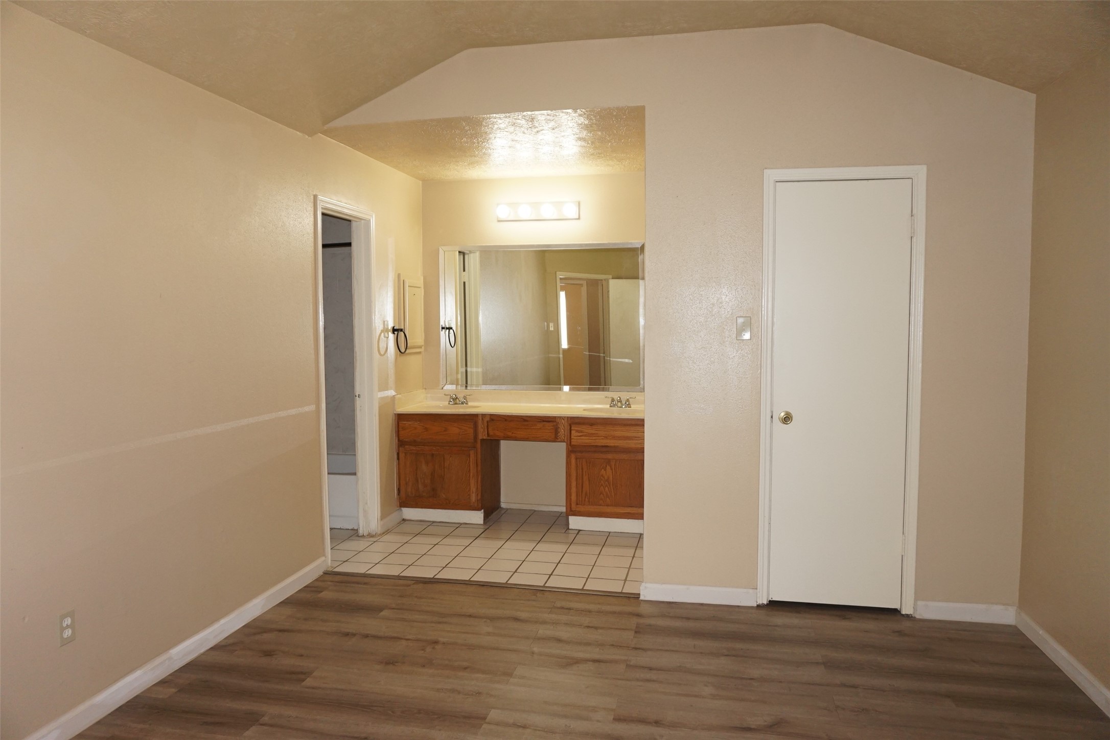 6023 Woodmancote Drive Humble, TX 77346 - Photo 8 of 12 a view of a bathroom with sink and mirror