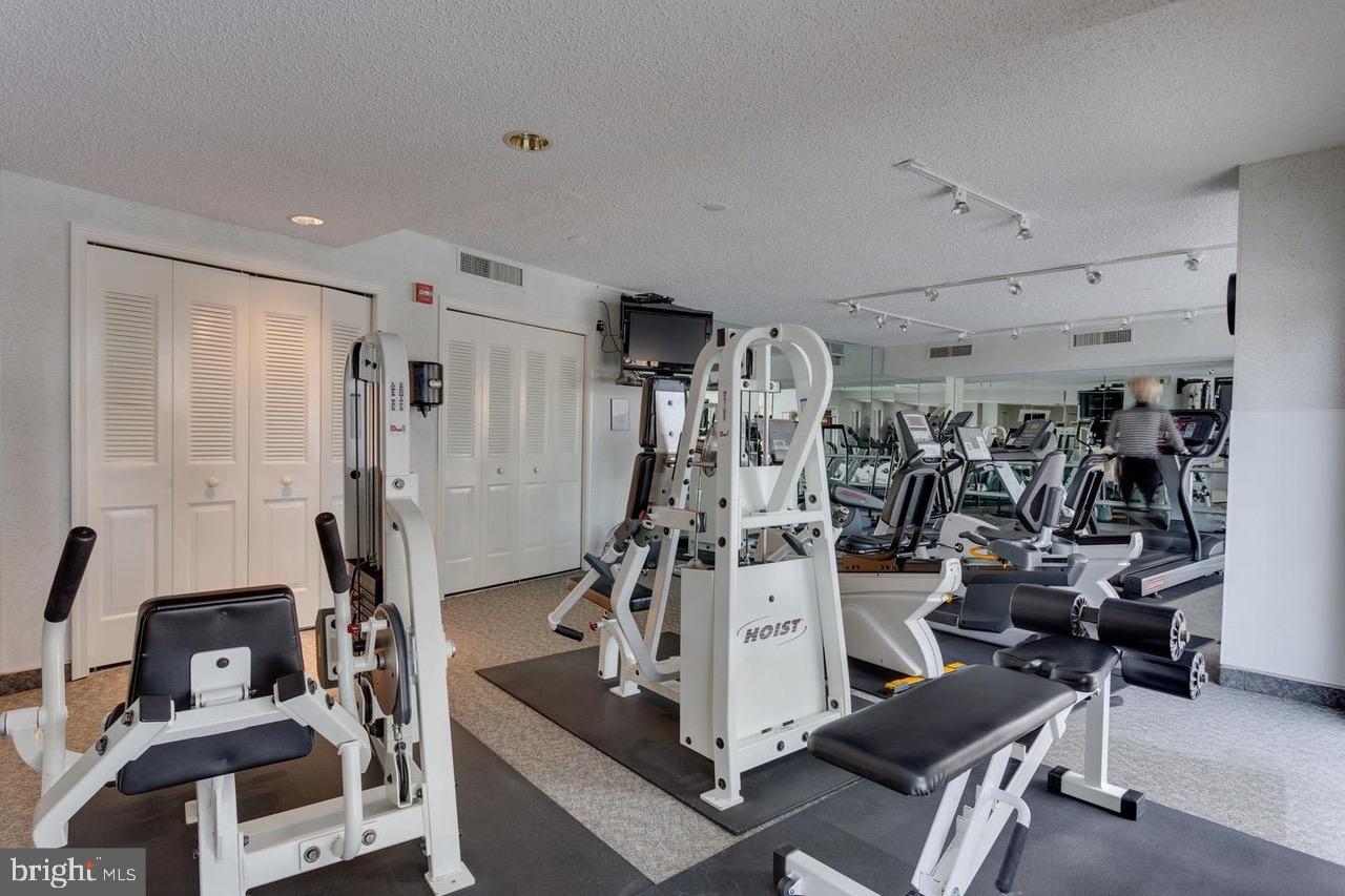 1101 South Arlington Ridge Road, Unit 704 Arlington, VA 22202 - Photo 15 of 70 a view of a room with gym equipment