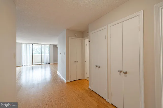 a kitchen with a sink appliances and cabinets