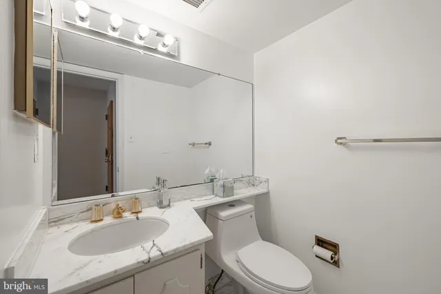 a view of a room with racks on the wall