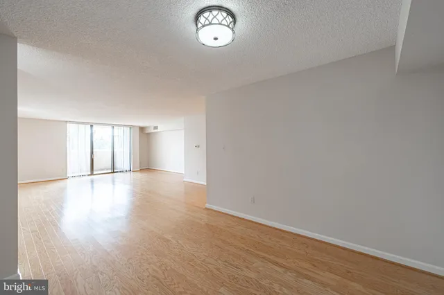 a bathroom with a bathtub and a toilet