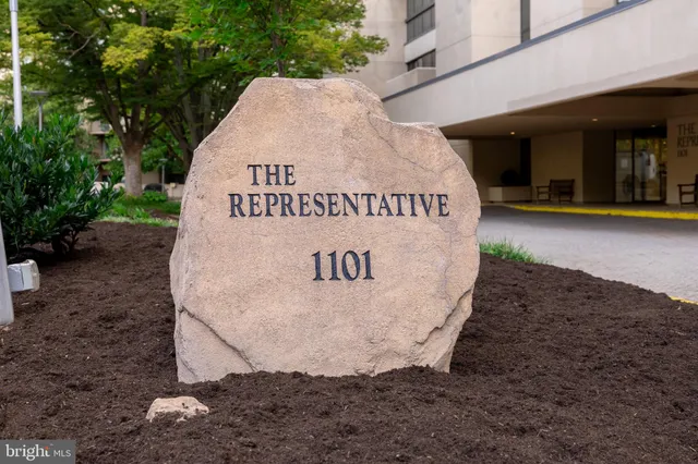 a bed room with a bed and a couch