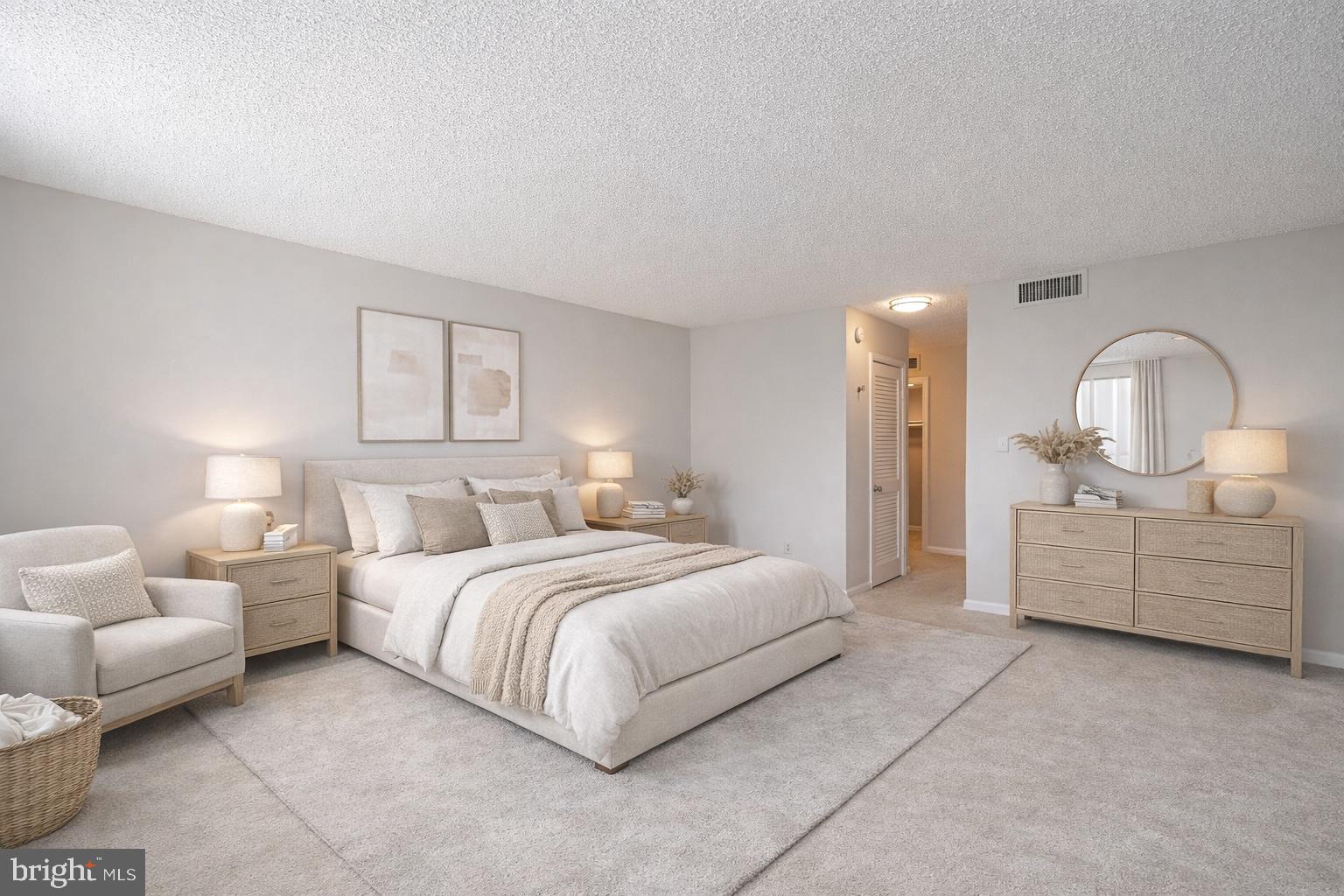 1101 South Arlington Ridge Road, Unit 704 Arlington, VA 22202 - Photo 44 of 70 a bed room with a bed and a couch