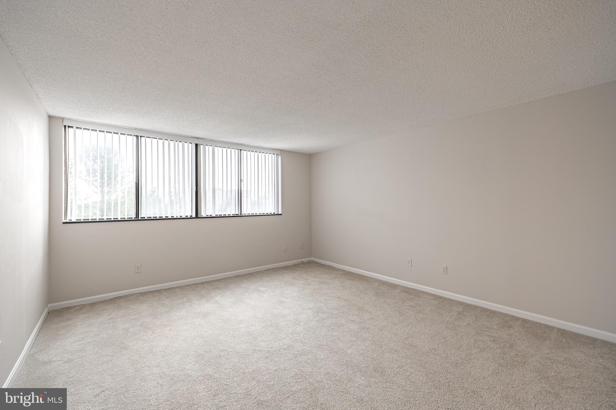 1101 South Arlington Ridge Road, Unit 704 Arlington, VA 22202 - Photo 45 of 70 an empty room with windows