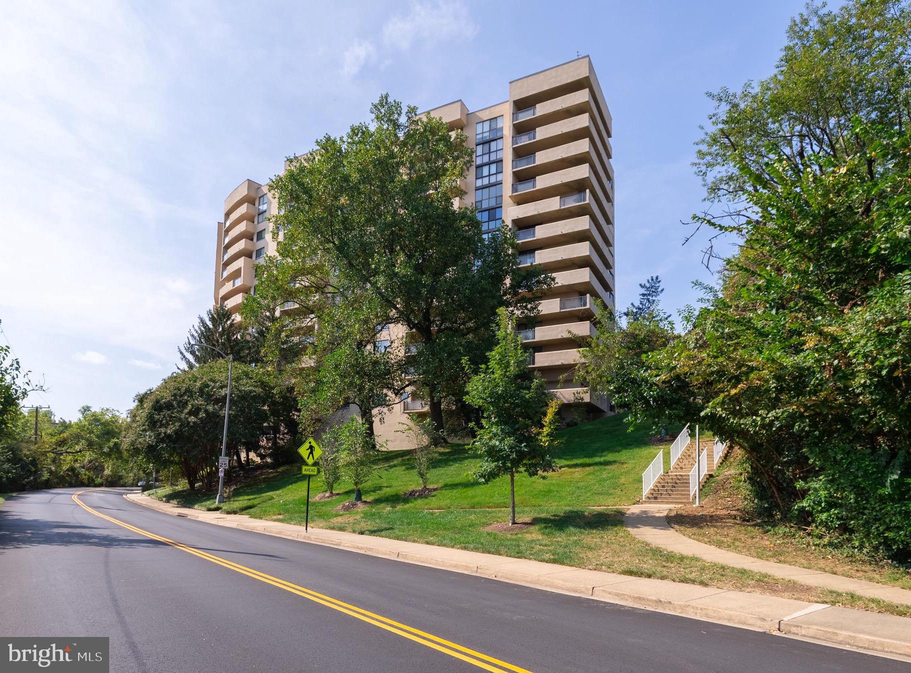 1101 South Arlington Ridge Road, Unit 704 Arlington, VA 22202 - Photo 64 of 70 a view of a tall building next to a road