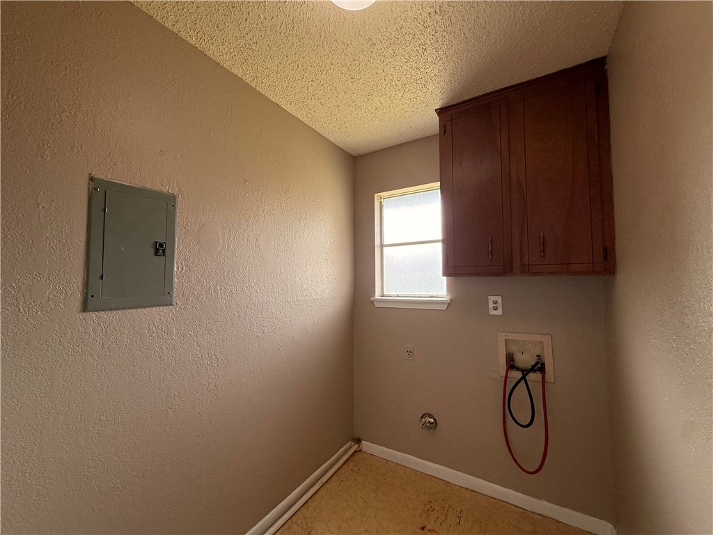 5018 Wingfoot Lane, Unit A Corpus Christi, TX 78413 - Photo 6 of 13 a bathroom with shower and window