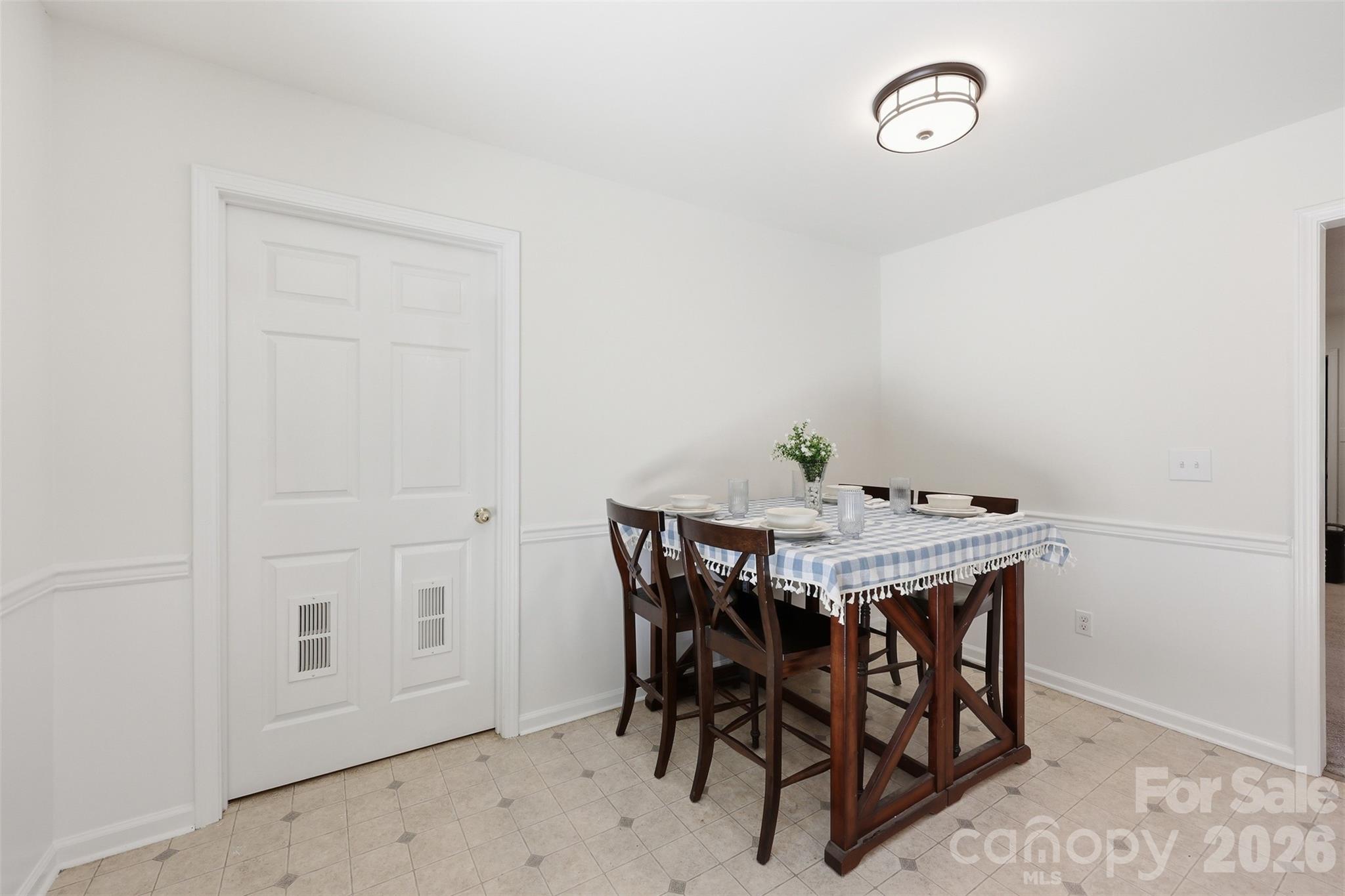 913 Pleasant Ridge Road Fort Mill, SC 29715 - Photo 13 of 40 a view of a dining room with furniture