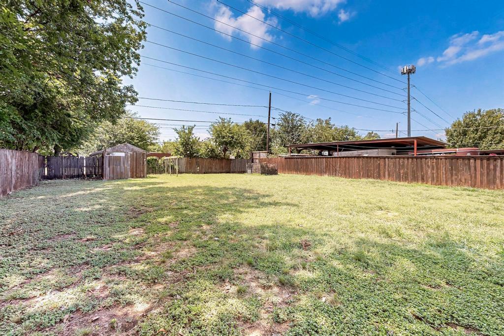 1609 Biggs Terrace Arlington, TX 76010 - Photo 17 of 18 a swimming pool with outdoor seating and yard