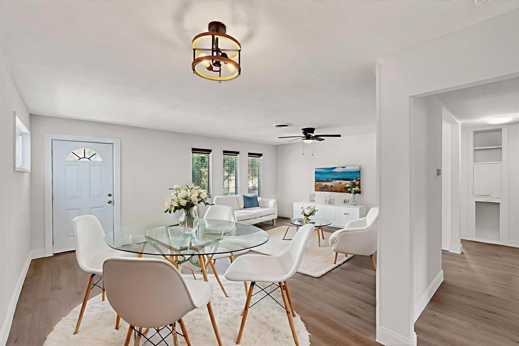 1609 Biggs Terrace Arlington, TX 76010 - Photo 3 of 18 a view of a dining room with furniture wooden floor and a rug
