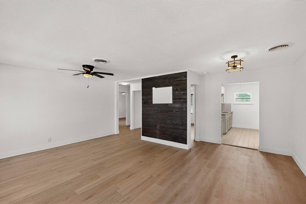 1609 Biggs Terrace Arlington, TX 76010 - Photo 8 of 18 wooden floor in an empty room