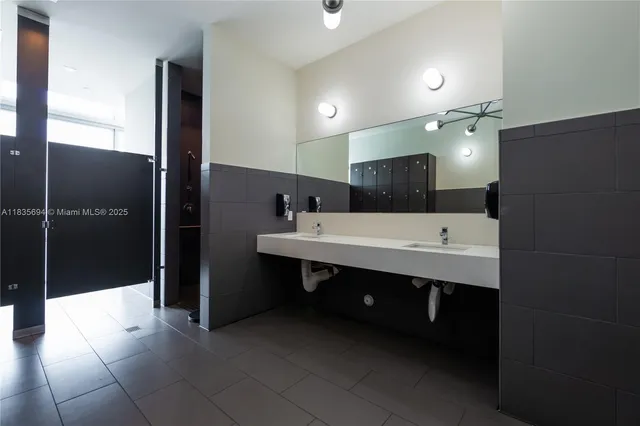 a view of swimming pool with two potted plants and a chair