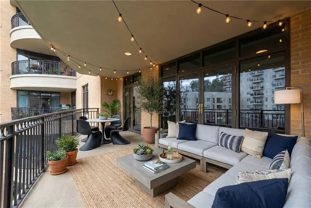 a living room with furniture and a table