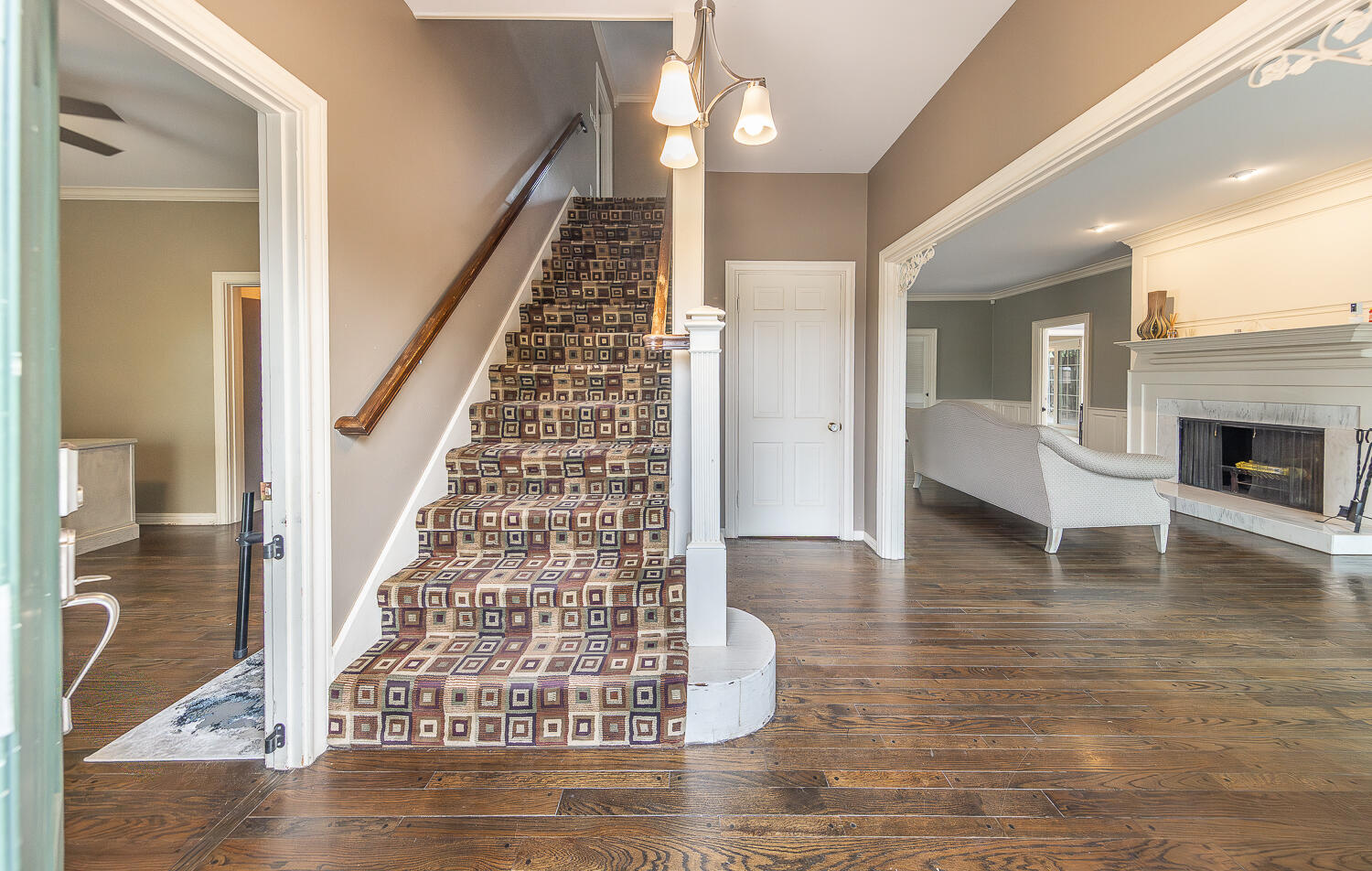 5104 19th Street Lubbock, TX 79407 - Photo 2 of 64 a view of entryway and hall with wooden floor