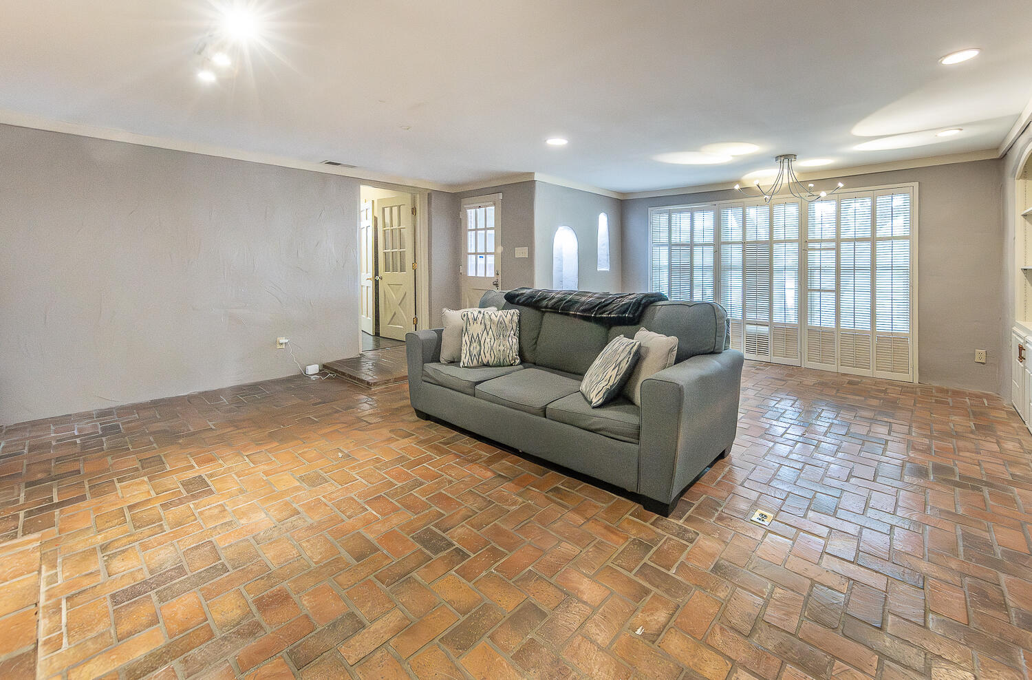 5104 19th Street Lubbock, TX 79407 - Photo 26 of 64 a living room with furniture and a rug