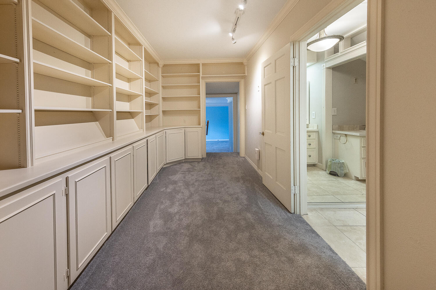 5104 19th Street Lubbock, TX 79407 - Photo 32 of 64 a view of an empty walk in closet