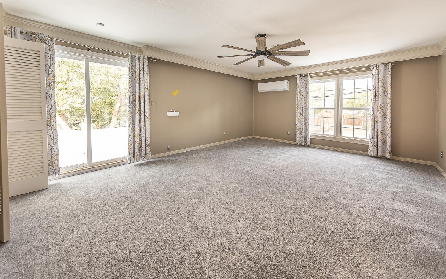 5104 19th Street Lubbock, TX 79407 - Photo 36 of 64 a view of an empty room with a window