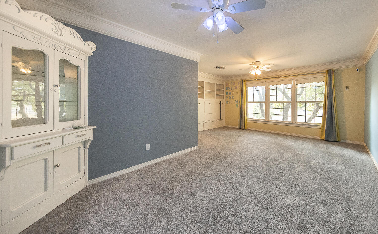 5104 19th Street Lubbock, TX 79407 - Photo 37 of 64 a view of an empty room with a window