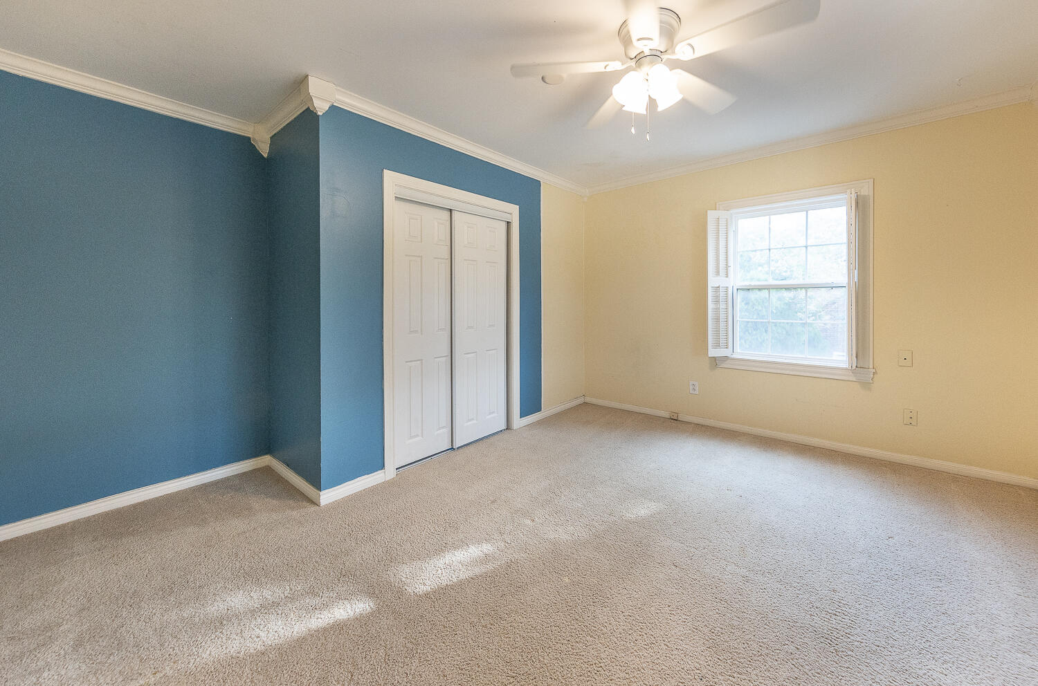 5104 19th Street Lubbock, TX 79407 - Photo 40 of 64 an empty room with windows and fan