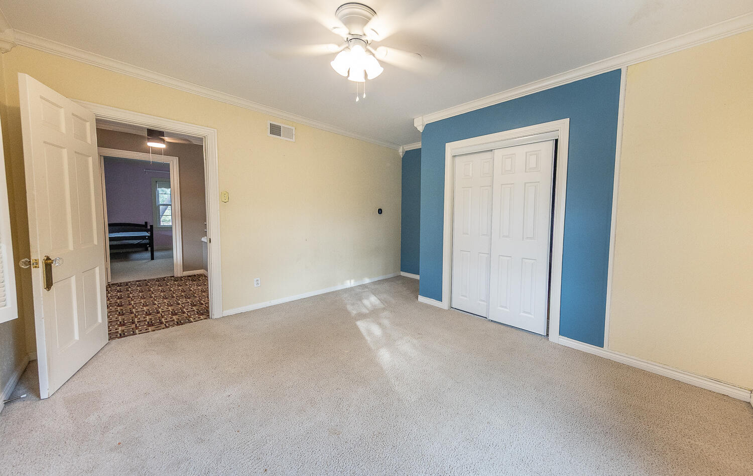 5104 19th Street Lubbock, TX 79407 - Photo 41 of 64 a view of an empty room with a ceiling fan