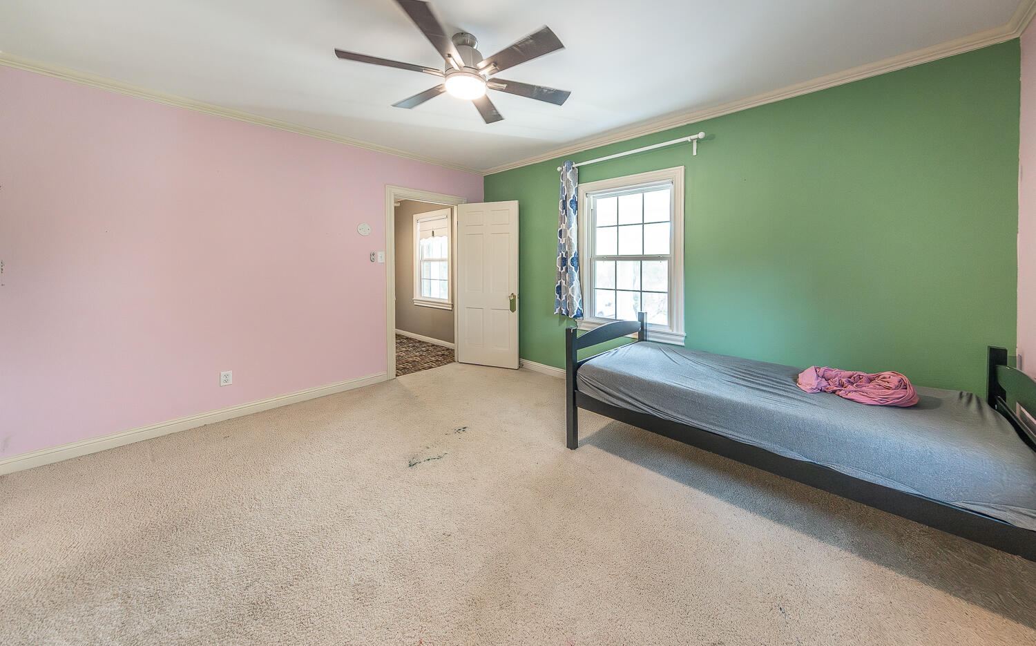 5104 19th Street Lubbock, TX 79407 - Photo 43 of 64 a bedroom with furniture and a window