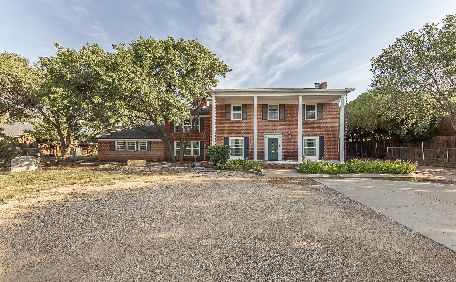 5104 19th Street Lubbock, TX 79407 - Photo 45 of 64 a front view of a house with a yard