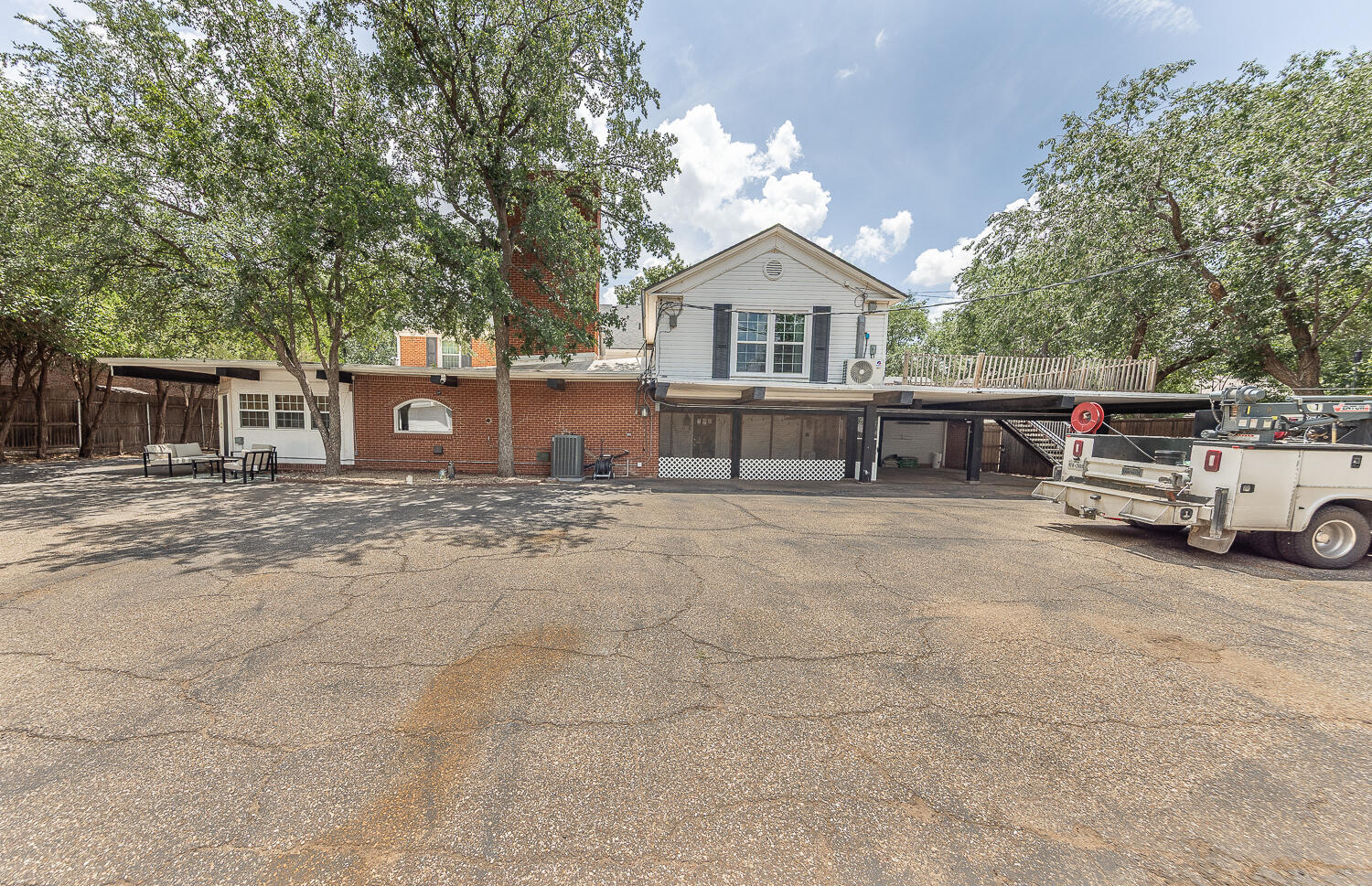 5104 19th Street Lubbock, TX 79407 - Photo 49 of 64 a view of house with outdoor space and parking
