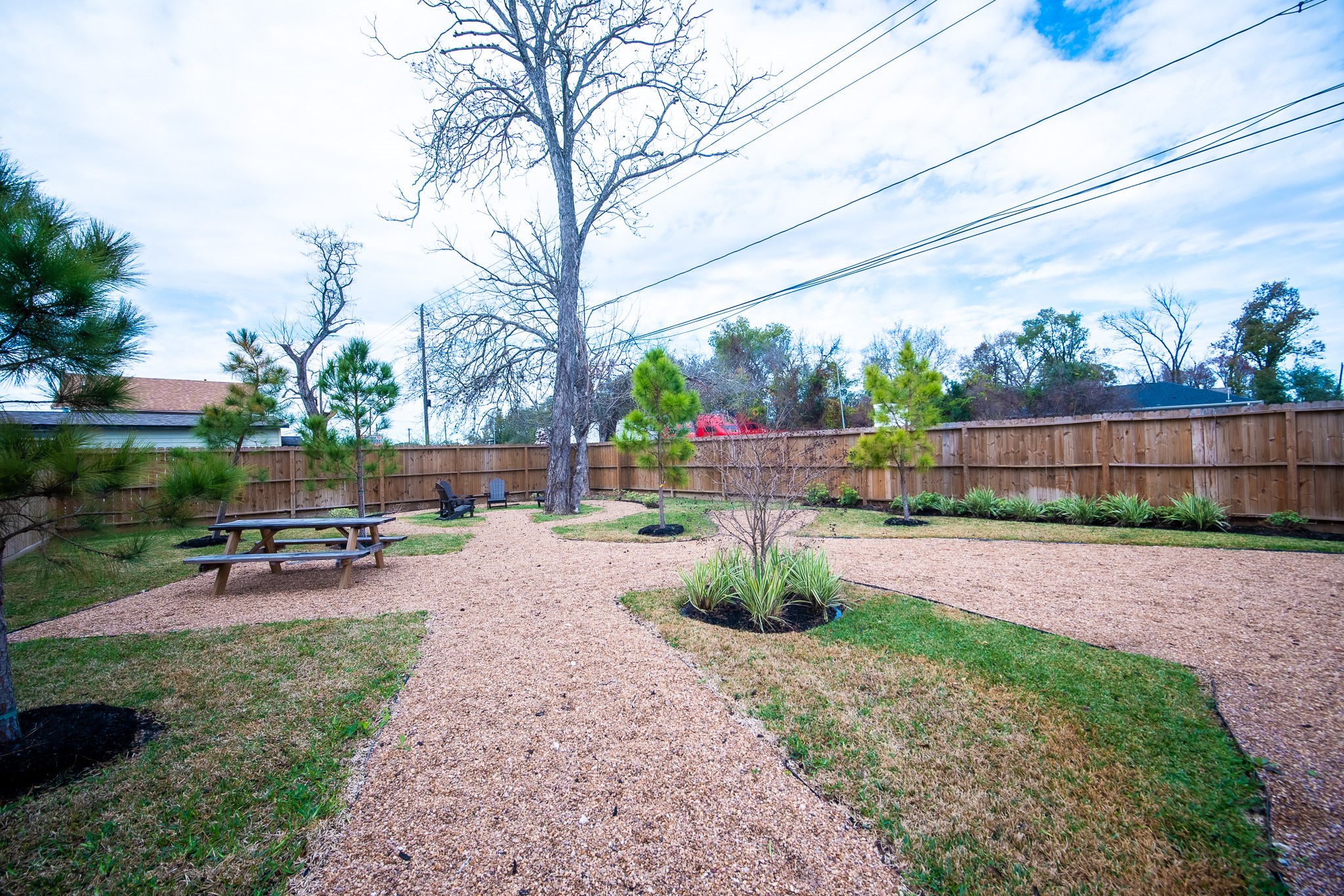 7611 Victory Reserve Street Houston, TX 77088 - Photo 11 of 11 a view of a backyard with sitting area