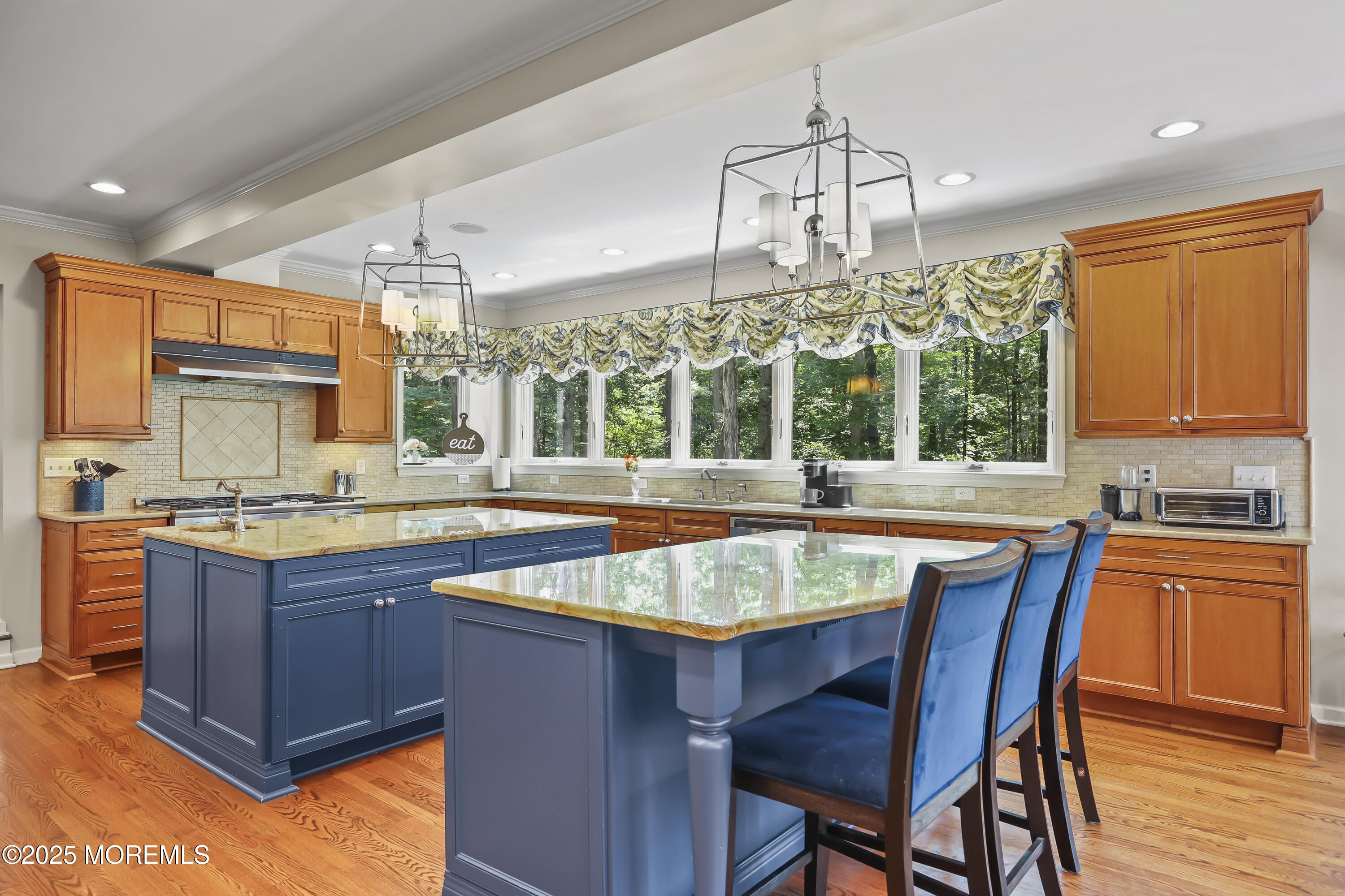 76 Culberson Road Basking Ridge, NJ 07920 - Photo 9 of 66 a large kitchen with a table and chairs in it
