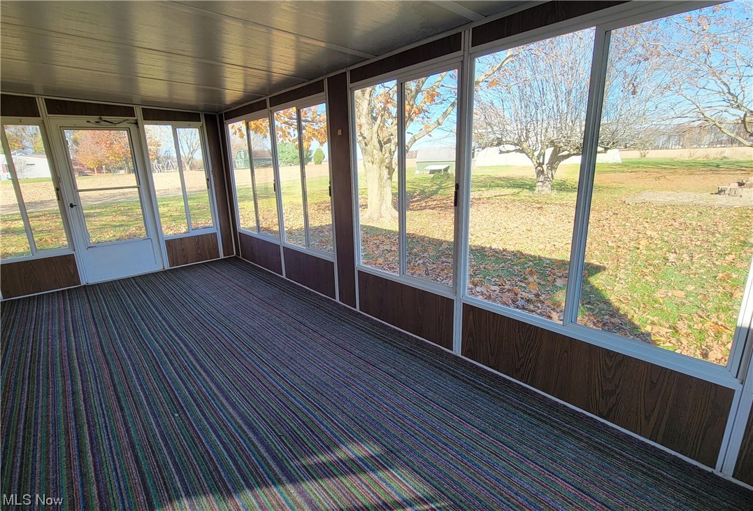 405 Bryan Road Milan, OH 44846 - Photo 33 of 35 View of unfurnished sunroom