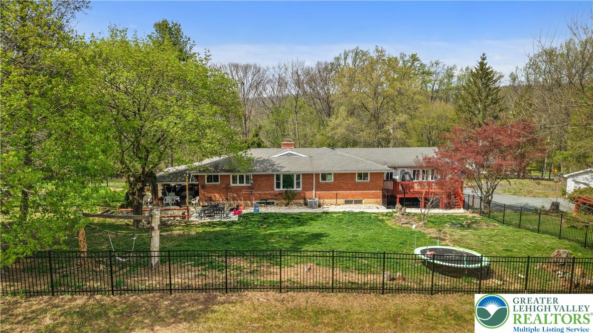 1042 Neffs Laurys Road Laurys Station, PA 18059 - Photo 2 of 27 a view of a house with a yard and sitting area