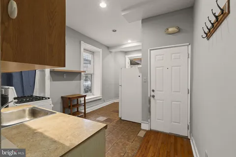 a bathroom with a bathtub and shower