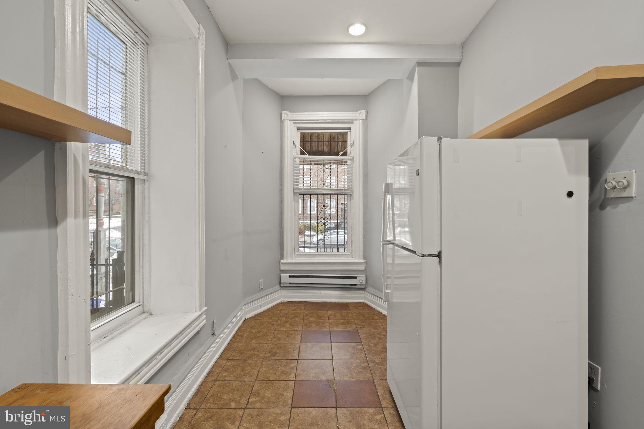 4630 Chester Avenue Philadelphia, PA 19143 - Photo 17 of 46 a bathroom with a bathtub and shower