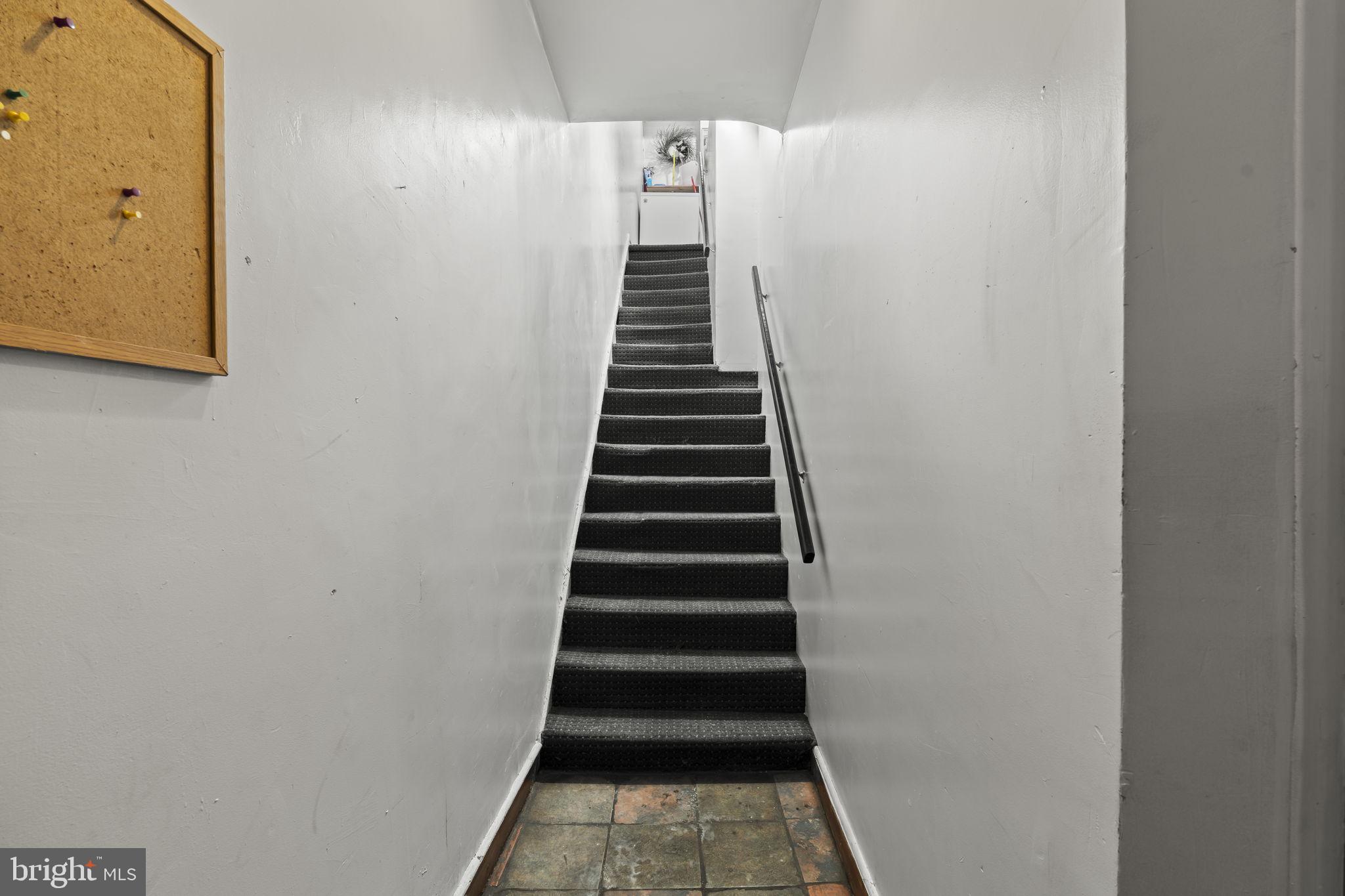 4630 Chester Avenue Philadelphia, PA 19143 - Photo 27 of 46 a view of a hallway with stairs