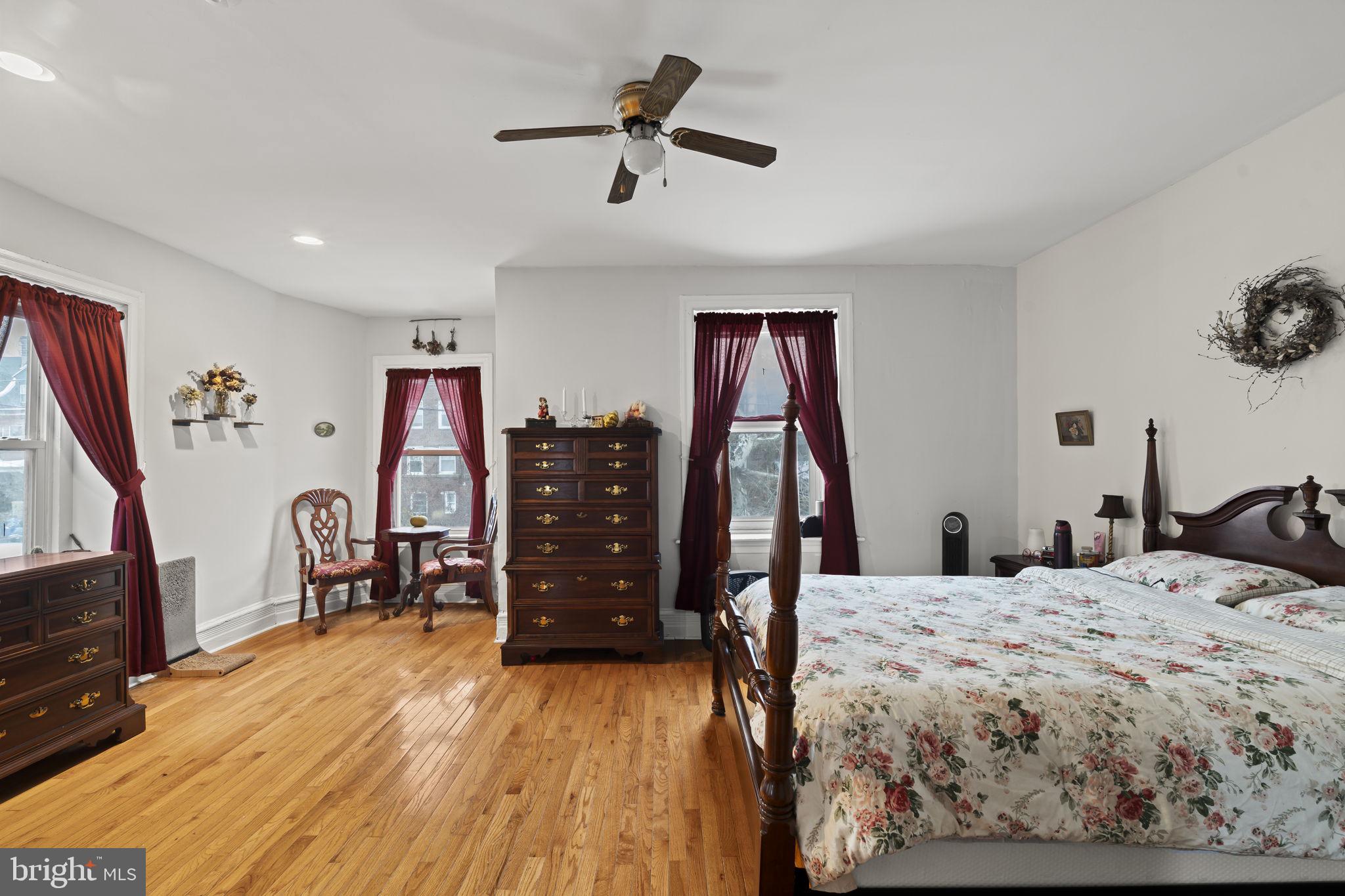 4630 Chester Avenue Philadelphia, PA 19143 - Photo 37 of 46 a bed room with a bed and a television