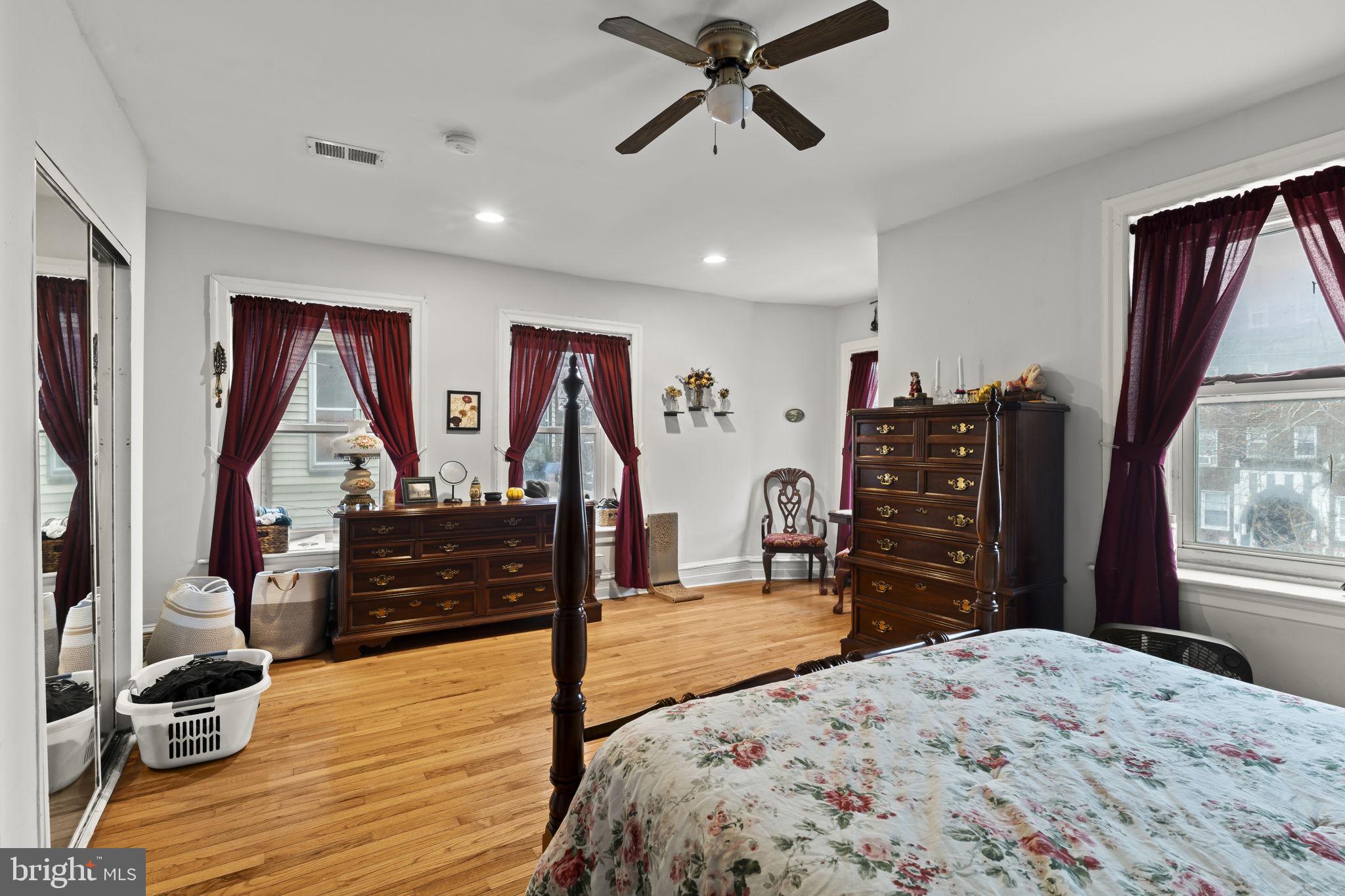 4630 Chester Avenue Philadelphia, PA 19143 - Photo 39 of 46 a bedroom with furniture and a window