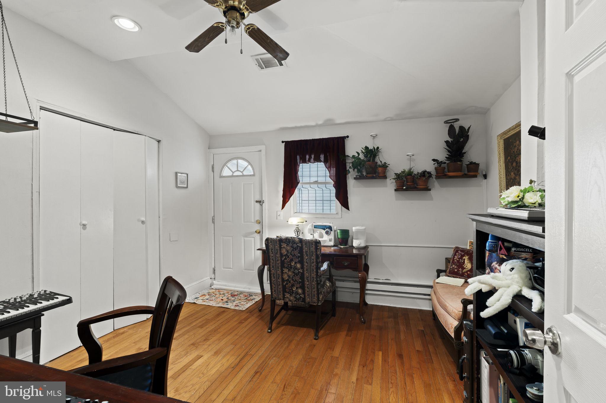 4630 Chester Avenue Philadelphia, PA 19143 - Photo 40 of 46 a living room with furniture