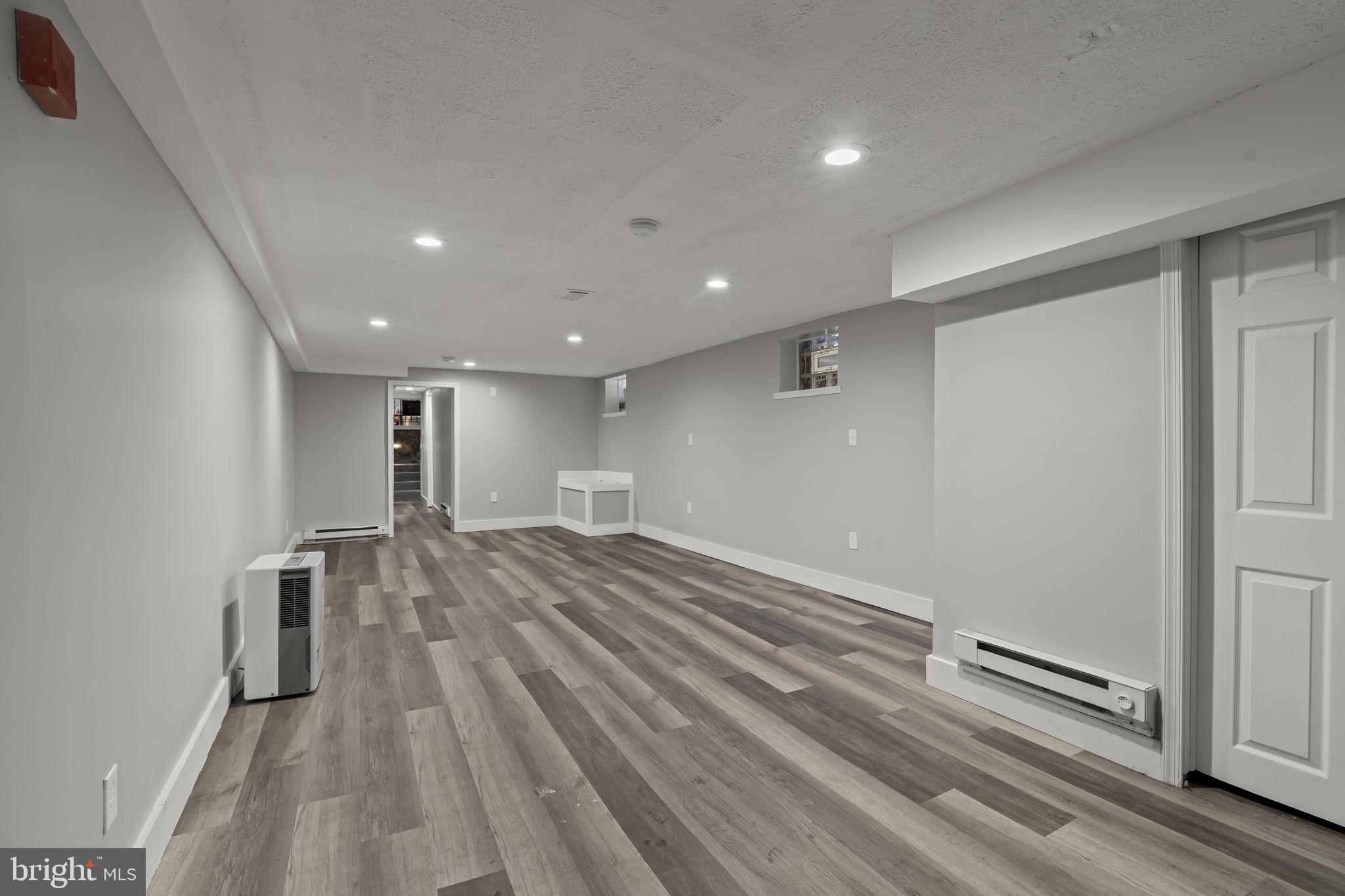 4630 Chester Avenue Philadelphia, PA 19143 - Photo 5 of 46 a view of hallway with wooden floor