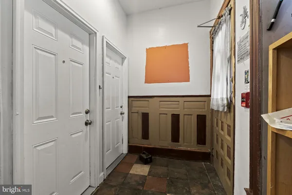 a view of a door and utility room