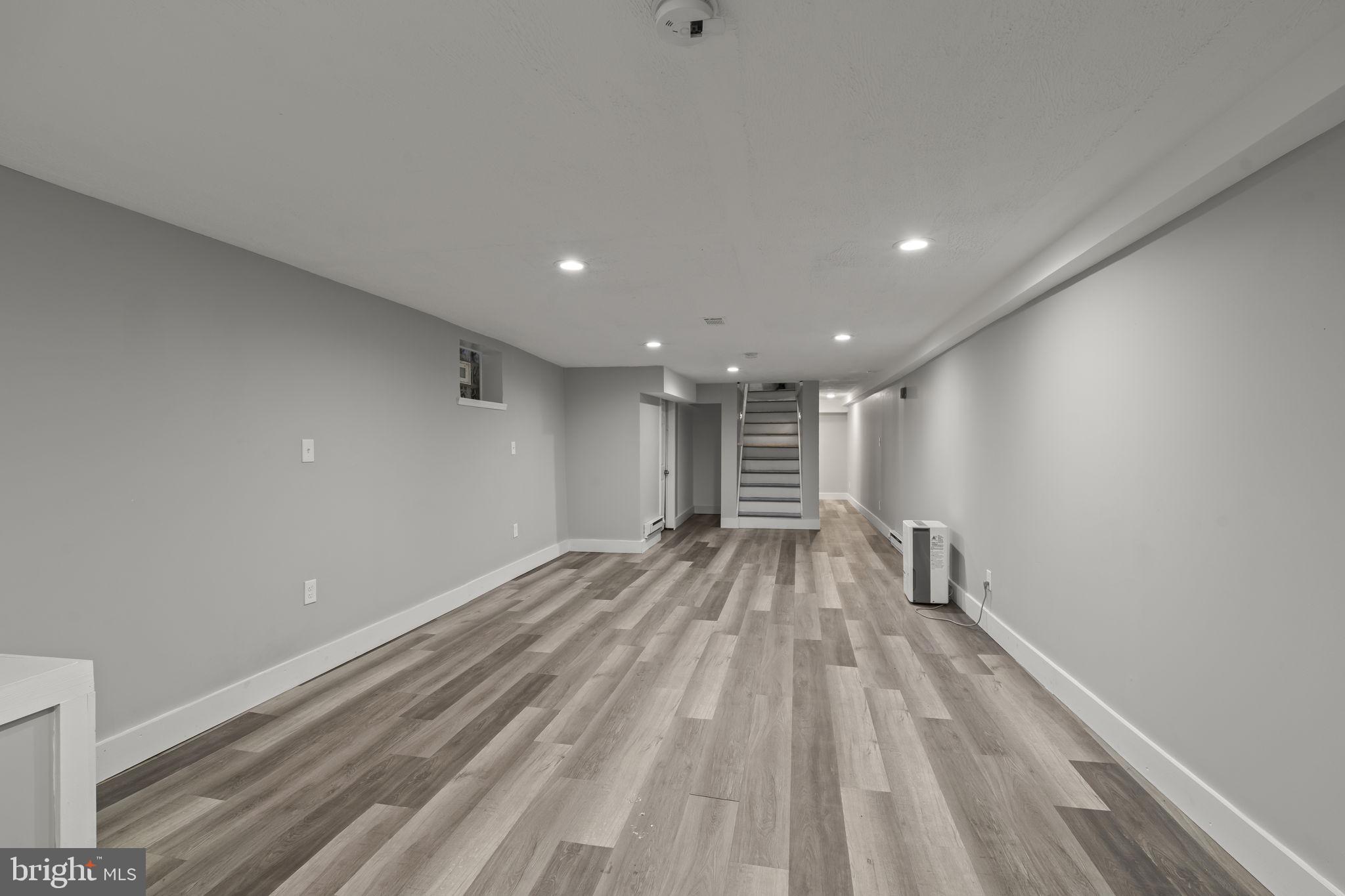 4630 Chester Avenue Philadelphia, PA 19143 - Photo 8 of 46 a view of empty room with wooden floor