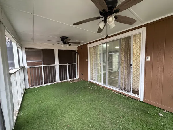 a view of a porch in front of a house
