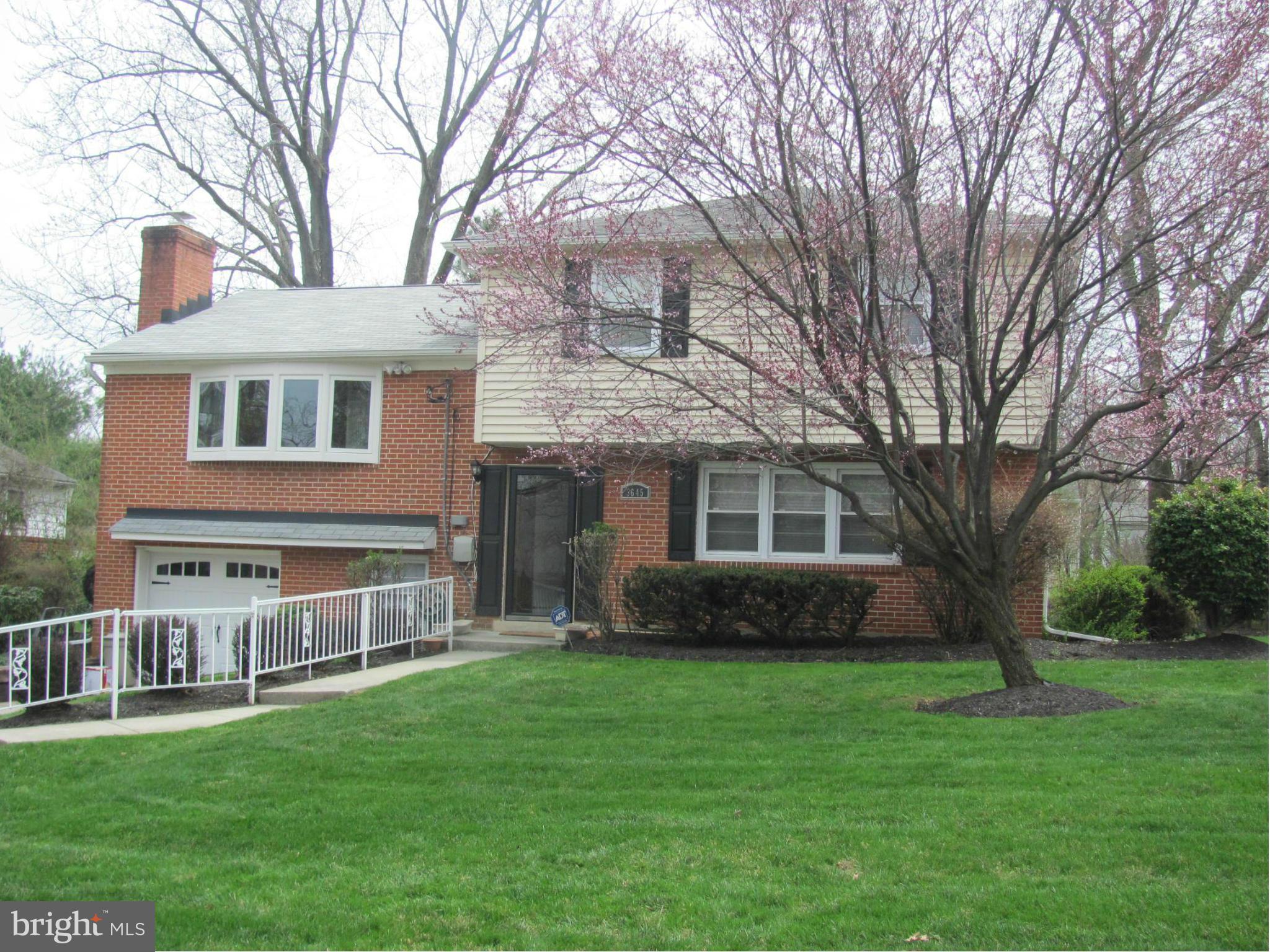 3645 Langrehr Road Baltimore, MD 21244 - Photo 1 of 25 a front view of a house with a garden