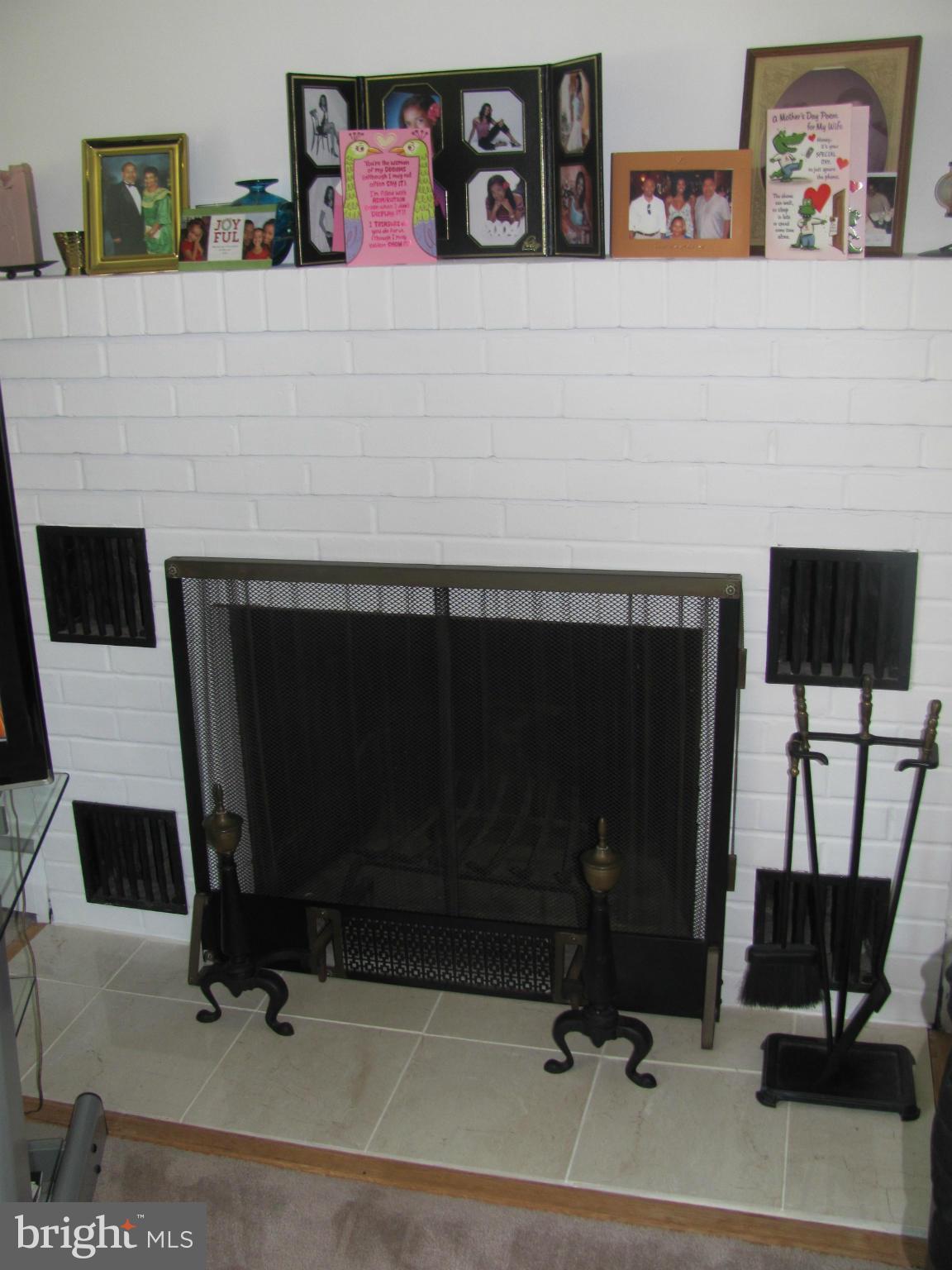 3645 Langrehr Road Baltimore, MD 21244 - Photo 13 of 25 a room with a couch and a fireplace