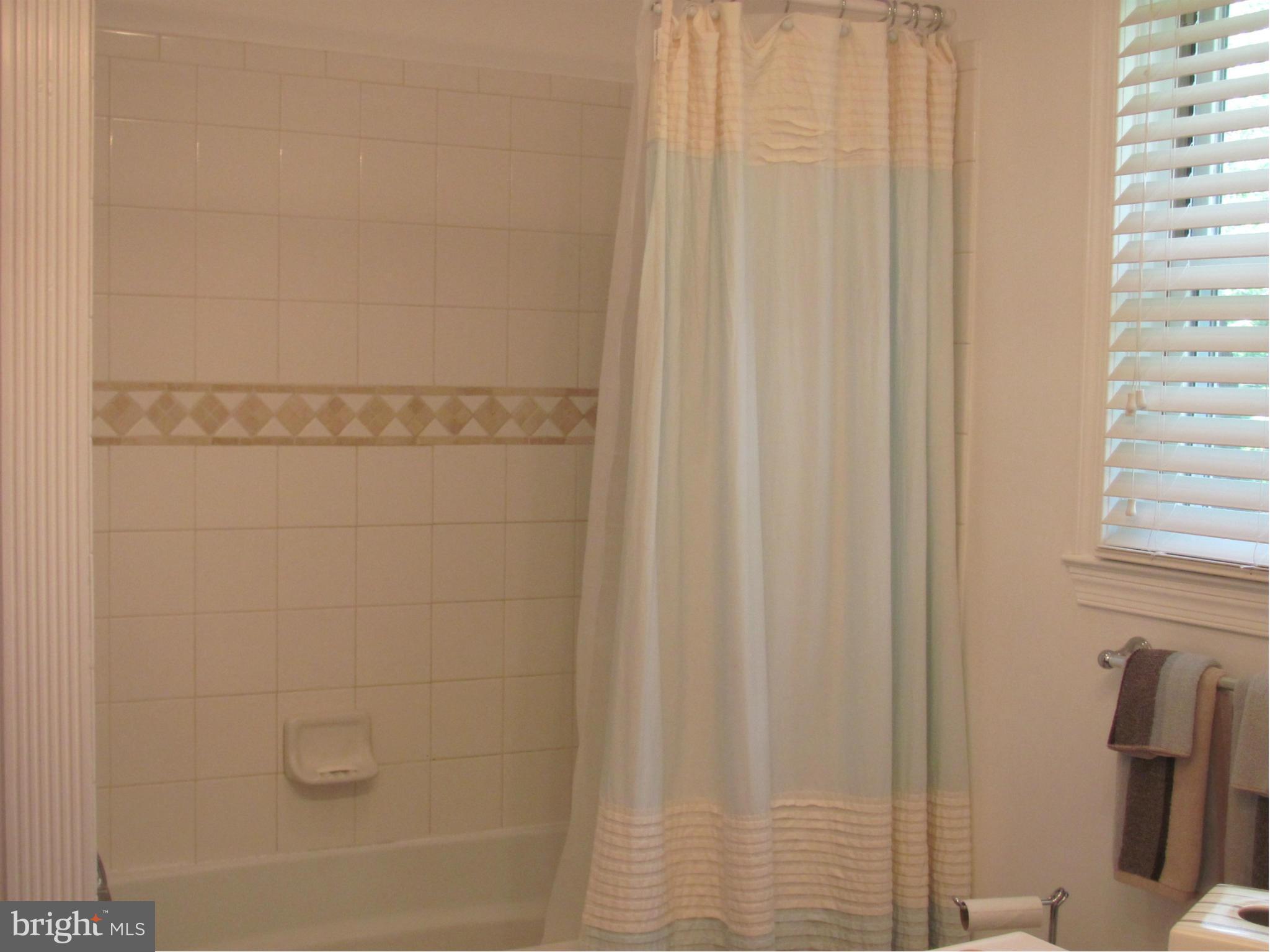3645 Langrehr Road Baltimore, MD 21244 - Photo 22 of 25 a bathroom with a shower