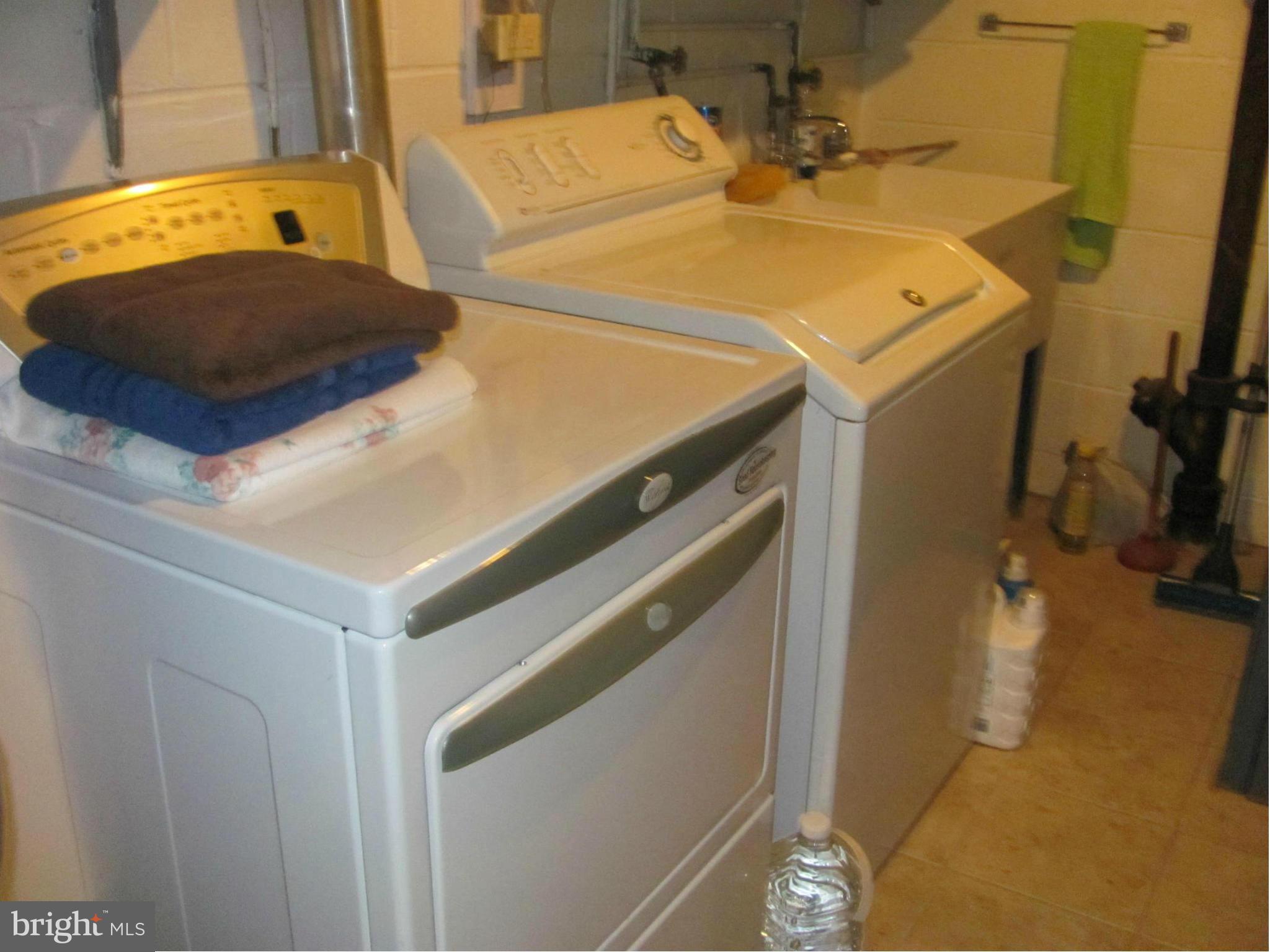 3645 Langrehr Road Baltimore, MD 21244 - Photo 23 of 25 a utility room with dryer and washer