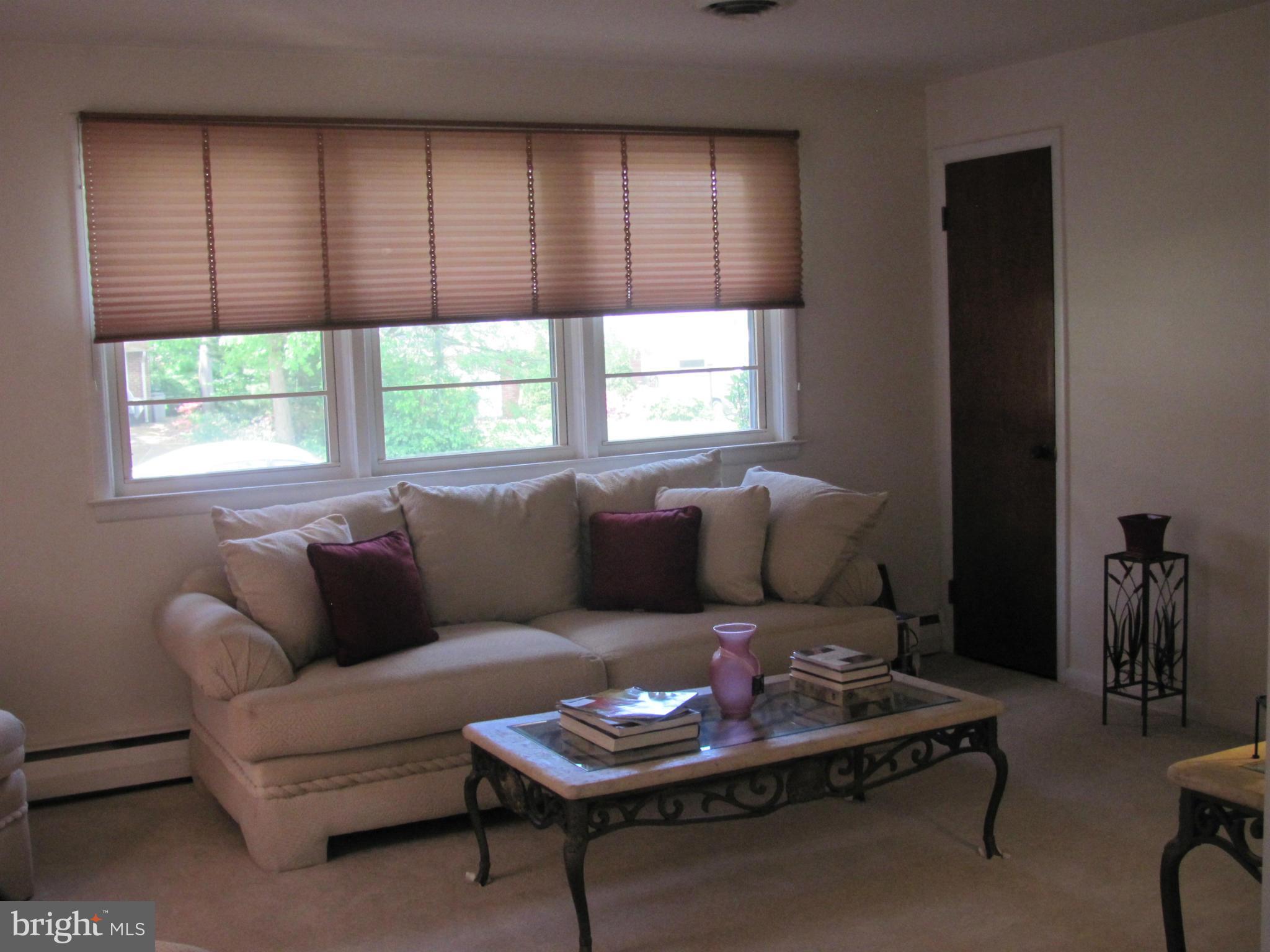 3645 Langrehr Road Baltimore, MD 21244 - Photo 6 of 25 a living room with furniture and a window