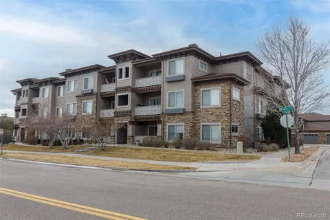a view of a building with a street