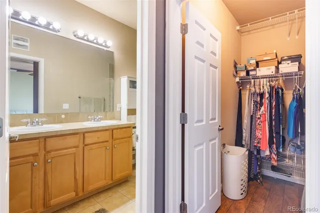 a view of a bathroom with a tub and a sink