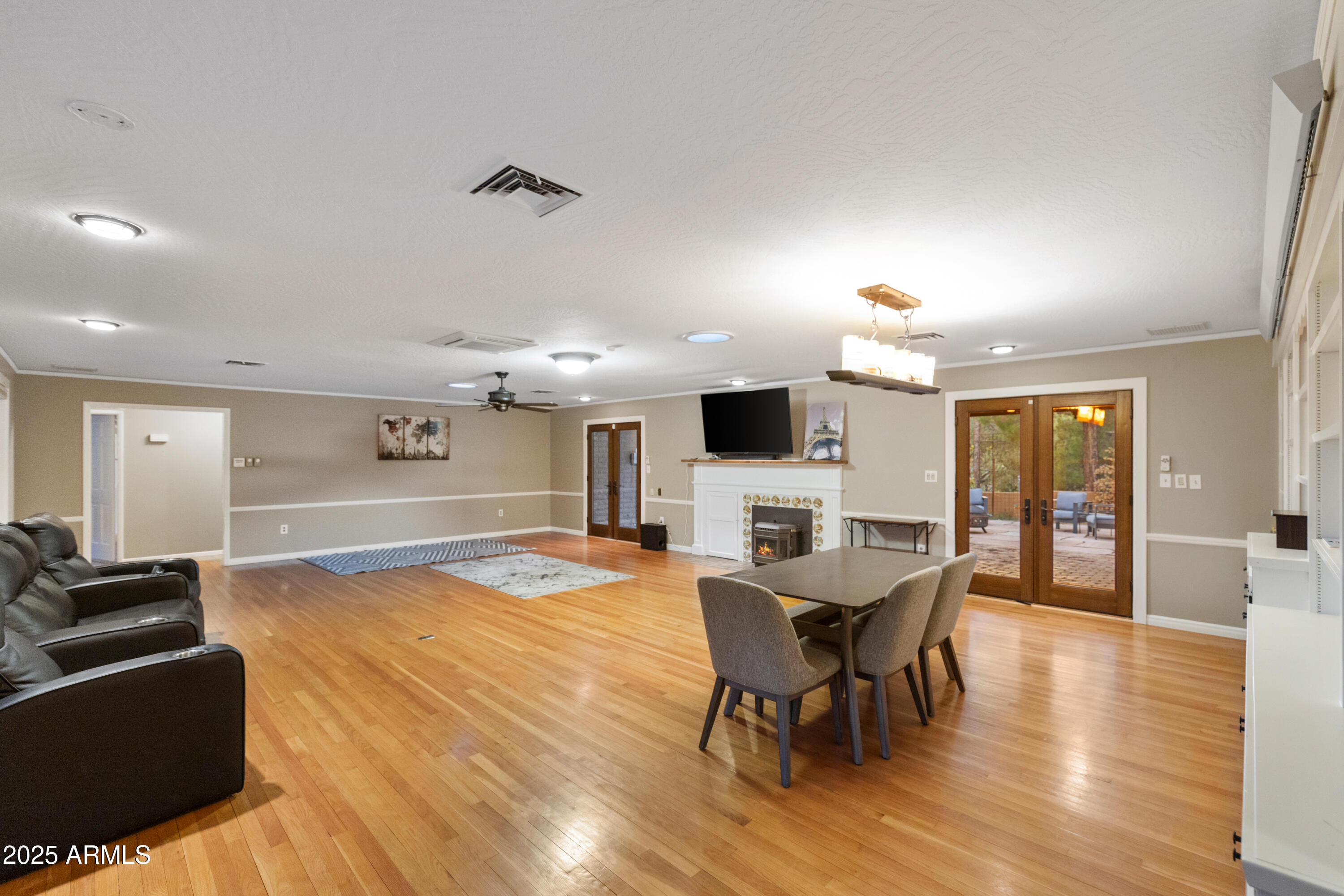 195 Courthouse Butte Road Sedona, AZ 86351 - Photo 11 of 31 a view of a dining room with furniture window and wooden floor