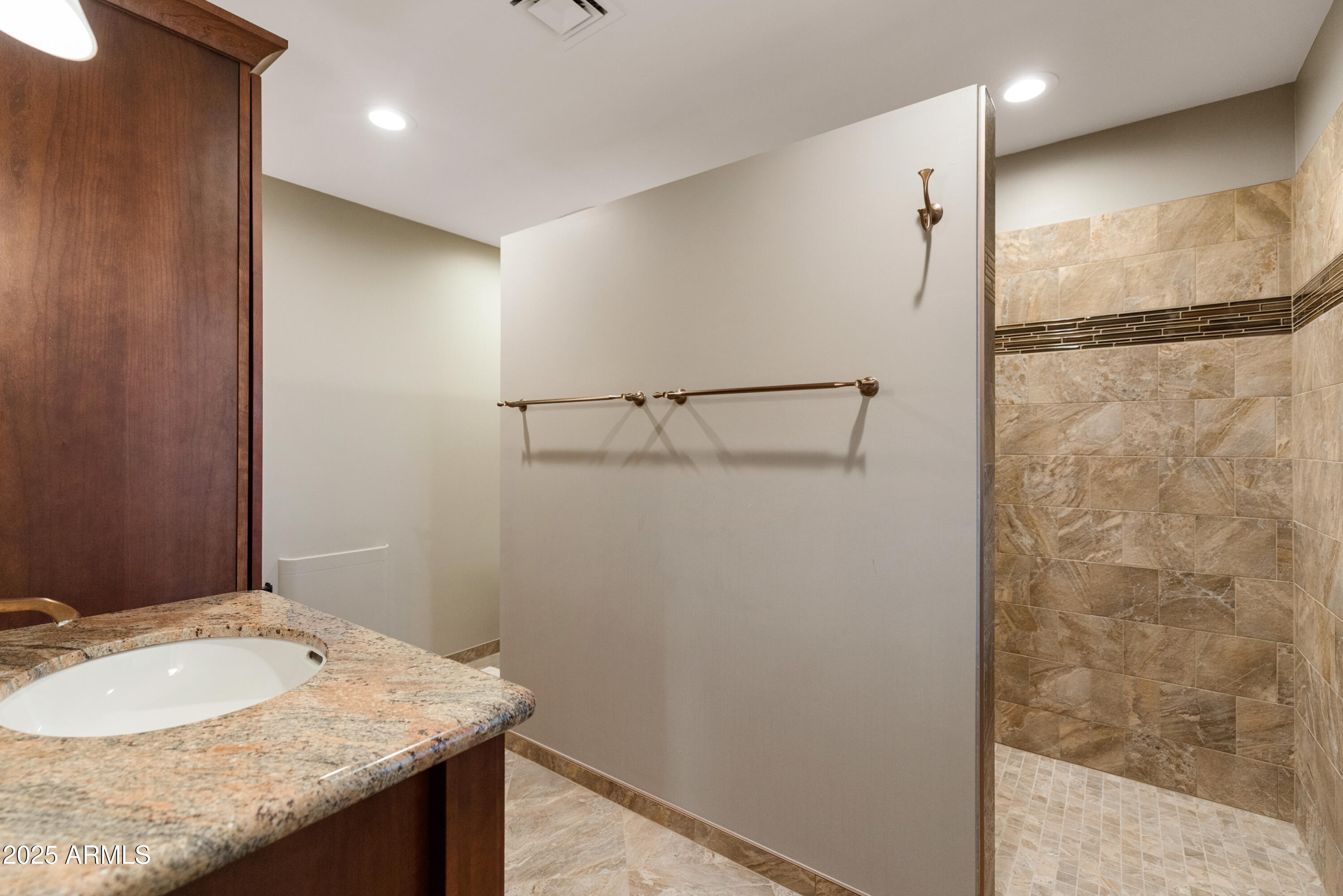 195 Courthouse Butte Road Sedona, AZ 86351 - Photo 23 of 31 a bathroom with a granite countertop sink and a mirror
