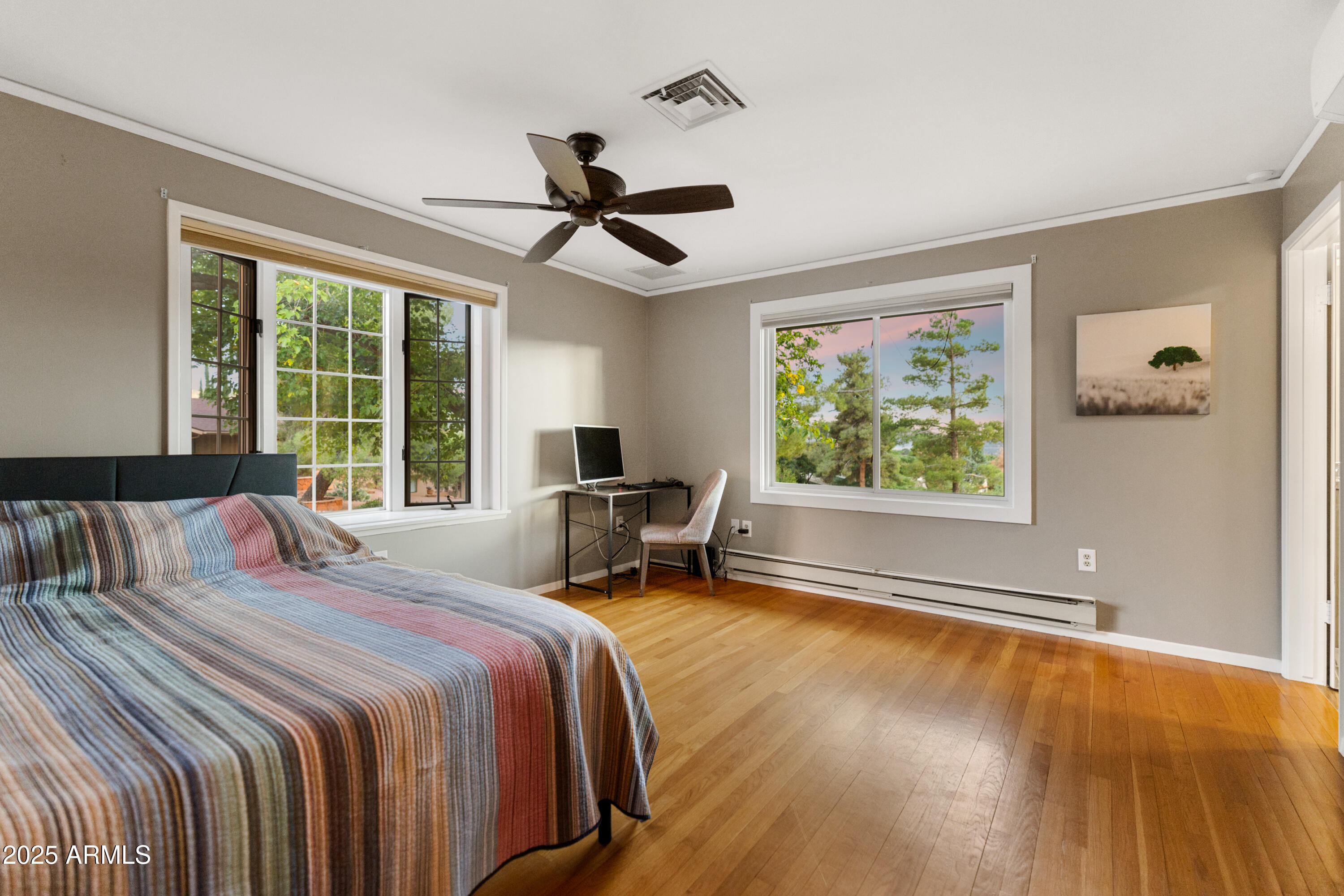 195 Courthouse Butte Road Sedona, AZ 86351 - Photo 26 of 31 a bedroom with a bed and a window